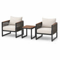 Ensemble bistro extérieur en métal et bois avec fauteuils crème et table